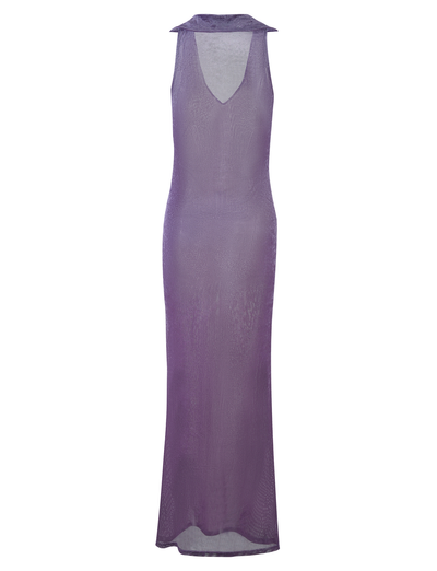 The ABRIL DRESS - PURPLE by TIGERMIST is a full-length, sleeveless dress featuring a high neckline and a deep V-shaped front. The semi-transparent fabric lends the dress a delicate and airy appearance, while its fitted silhouette smoothly flows to the floor.